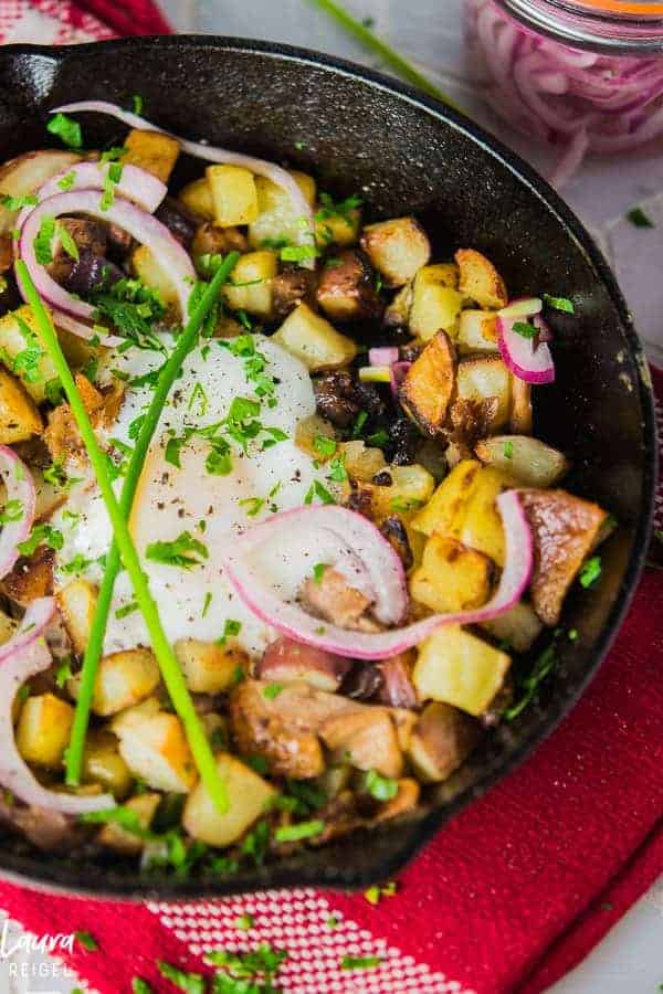 Duck hash with poached eggs, pickled onions, and duck fat potatoes.