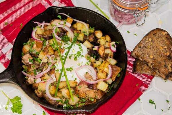 Duck hash with poached eggs, pickled onions, and duck fat potatoes.