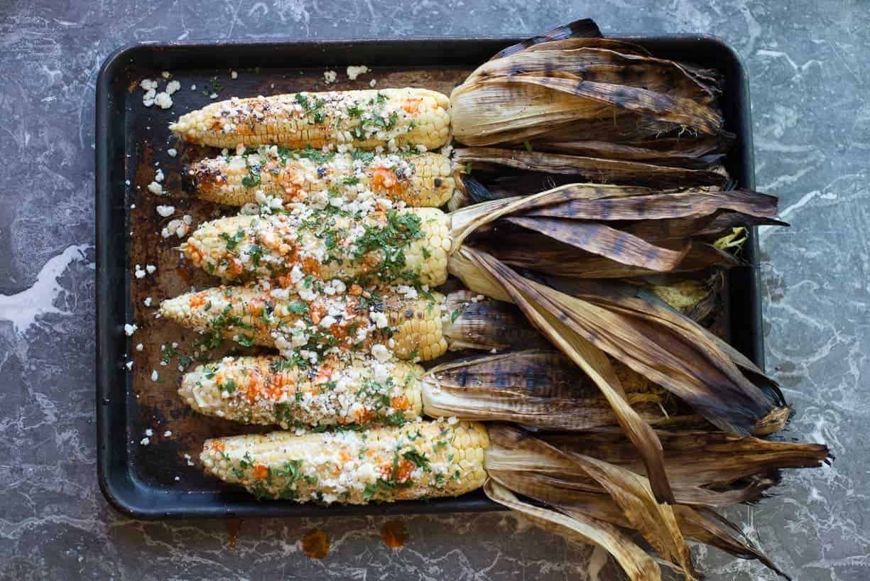 Mexican Street Corn with crema, cotija, and fresh cilantro Mexican Street Corn with crema, cotija, and fresh cilantro