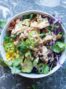Southwest chicken meal prep bowl.Chipotle chicken with corn, beans, and vegetables. by foodology geek