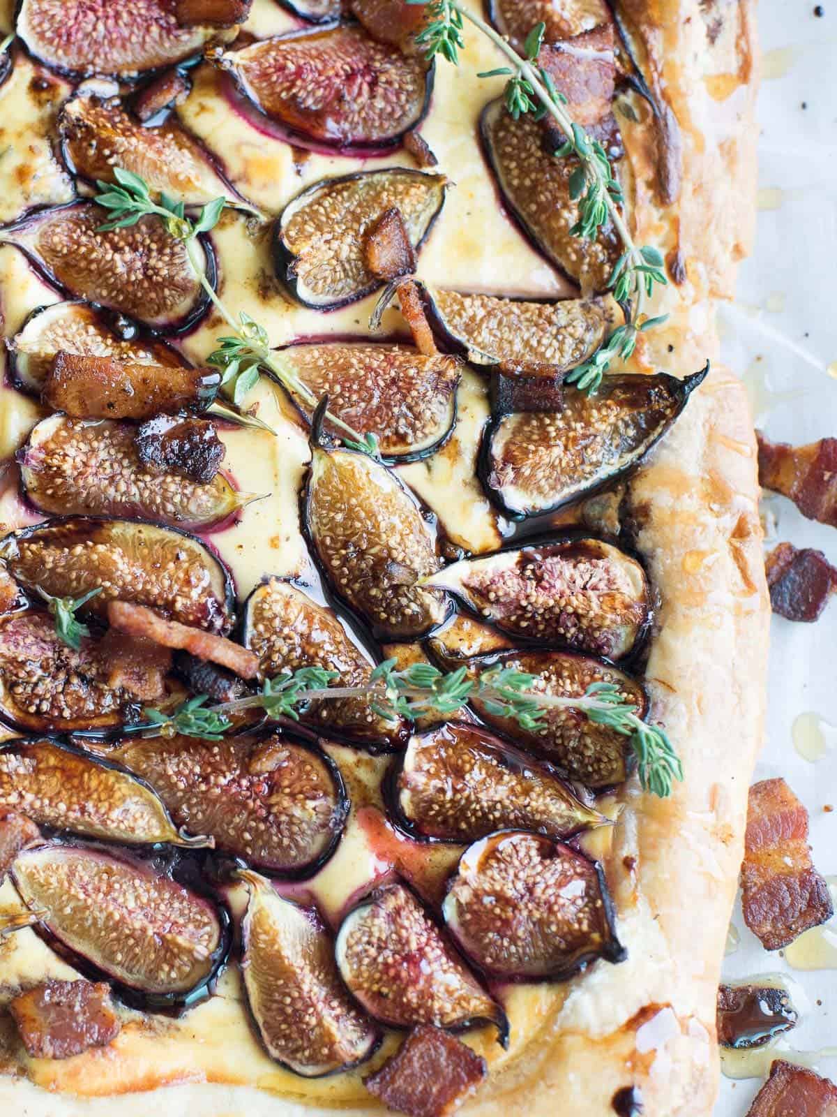 close up view of a goat cheese and fig tart