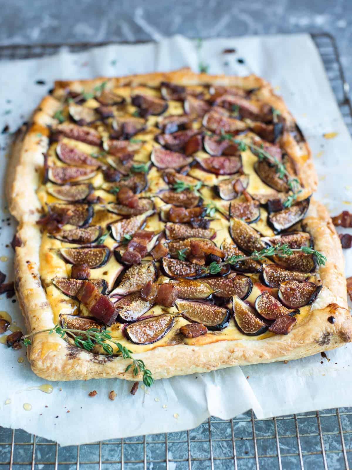puff pastry tart with fresh figs, crumble bacon, and a goat cheese filing