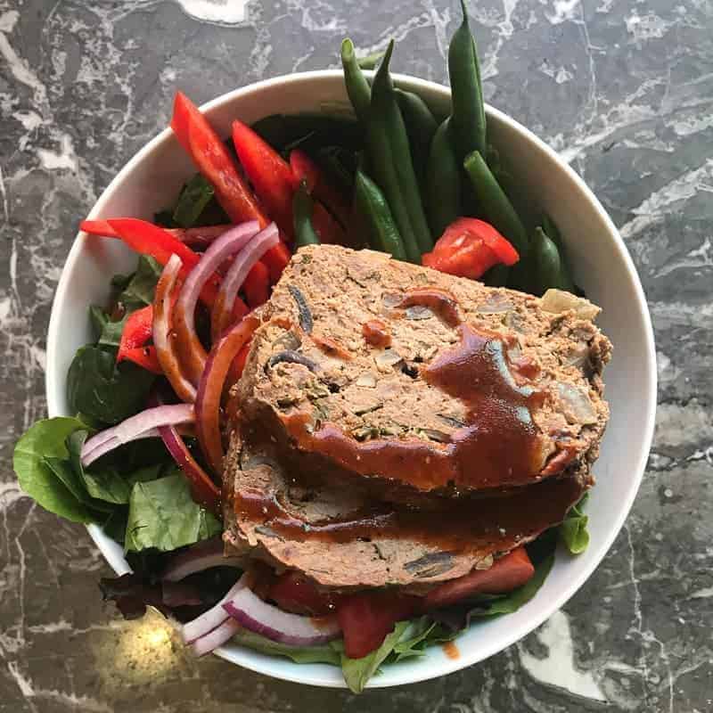 Paleo Meatloaf power bowl recipe with fresh vegetables and a tomato balsamic vinaigrette.