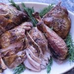 spatchcocked thanksgiving turkey plated recipe and featured image