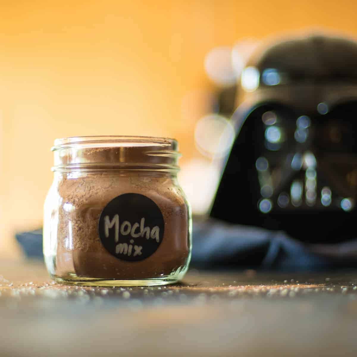 homemade mocha mix in a jar with a Darth Vadar cookie jar in the background