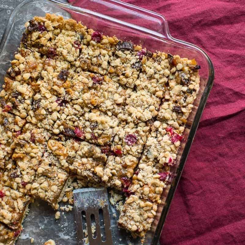 Cranberry Apricot Bars Recipe in a baking dish by foodology geek