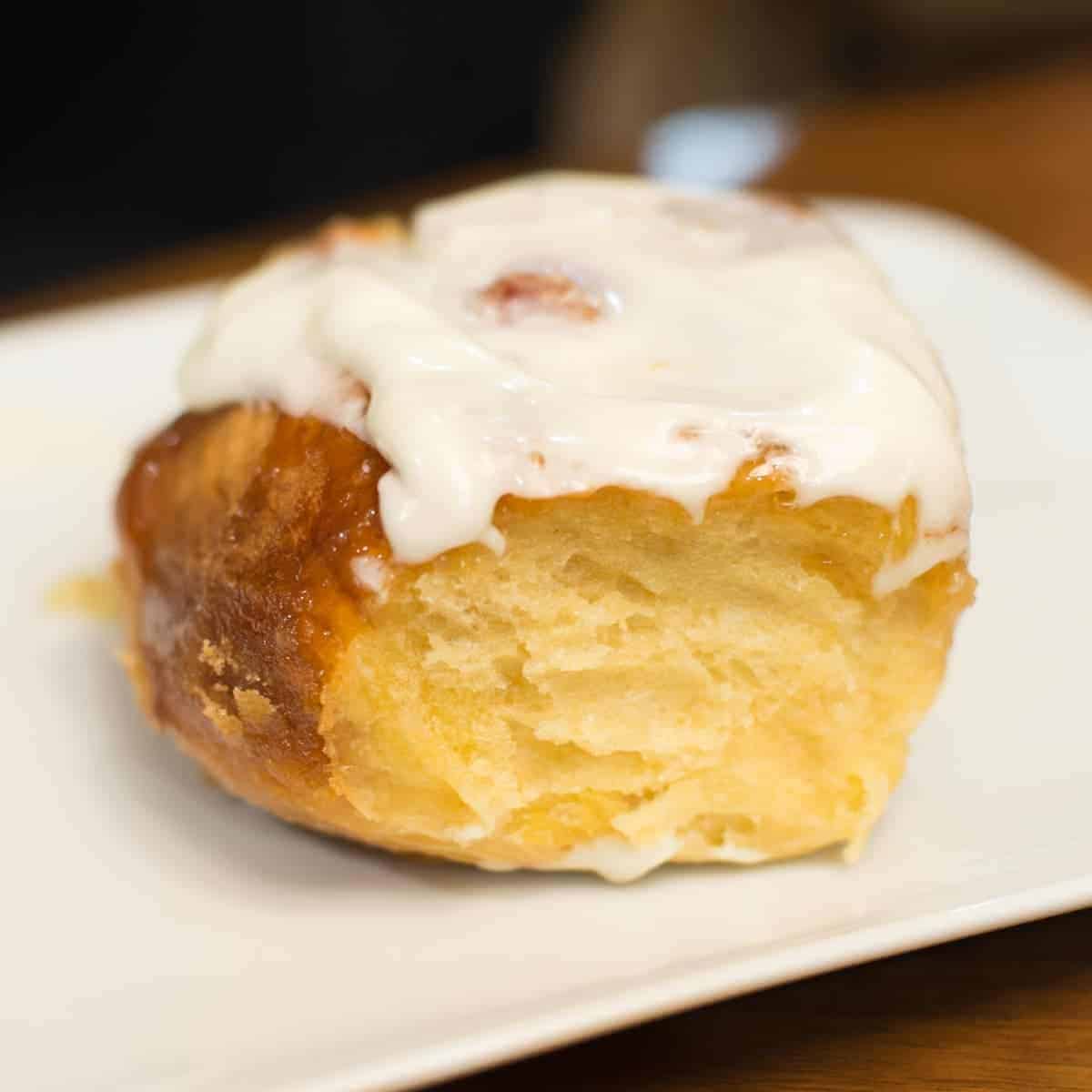 Pineapple Rolls with cream cheese frosting on a plate.