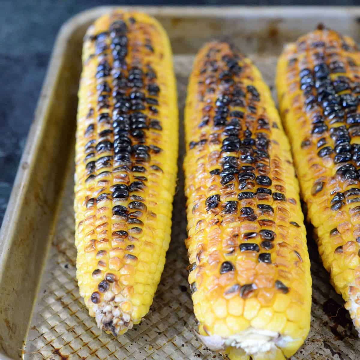 char grilled corn for roasted corn salsa. recipe by foodology geek