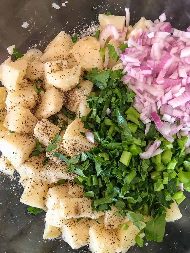 potato salad with herbs and onions added