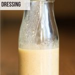 champagne vinaigrette in a glass bottle