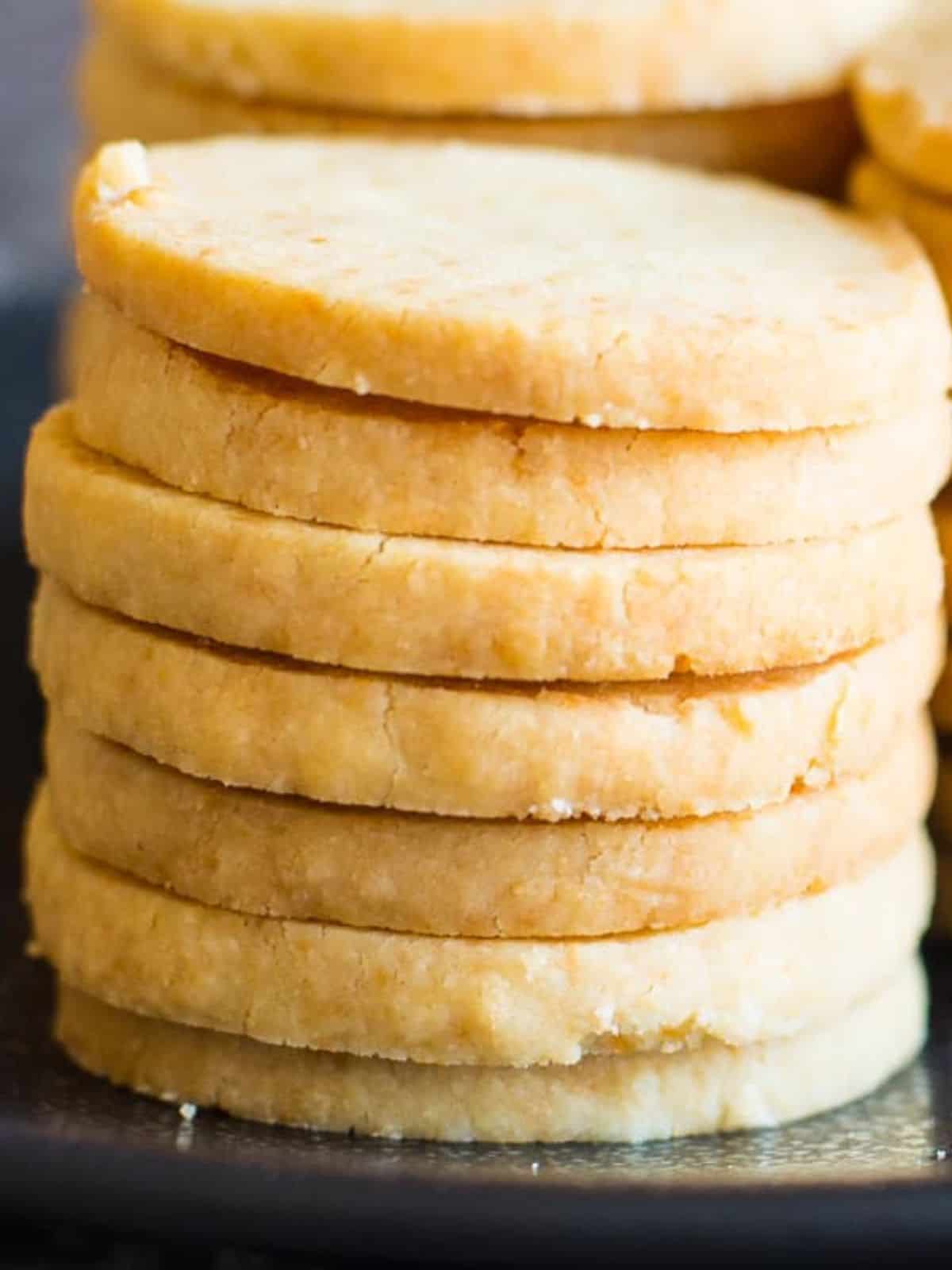 a stack parmesan shortbread biscuits showing the buttery cripsy texture