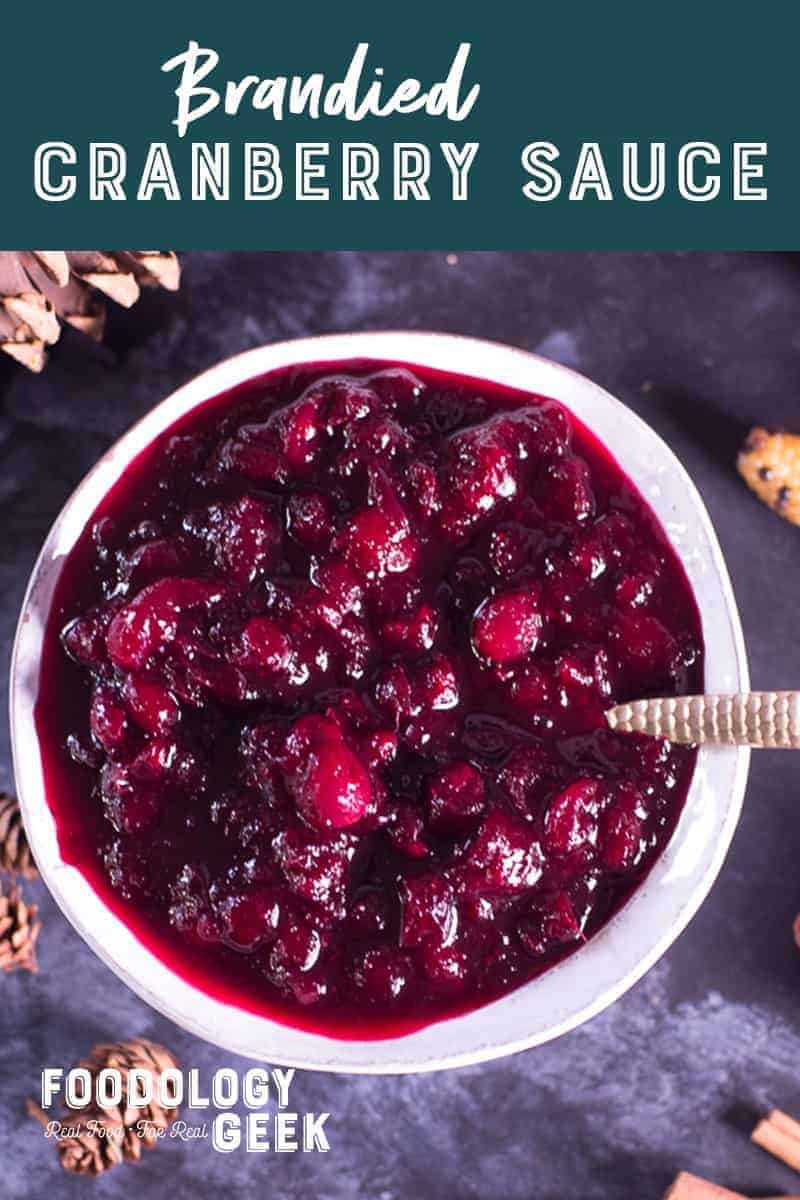 Cranberry sauce in a bowl Pinterest image by foodology geek.