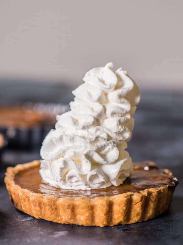 Mini pumpkin pie with a metric ton of whipped cream