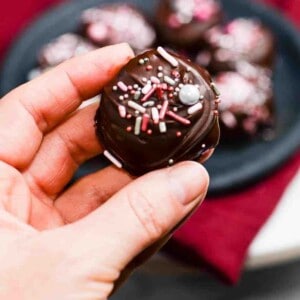 Homemade mounds coconut candy candy with white Christmas sprinkles