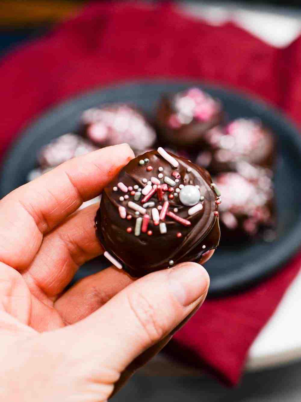 homemade mounds candy bites decorated with rose gold sprinkles from sprinklevpop