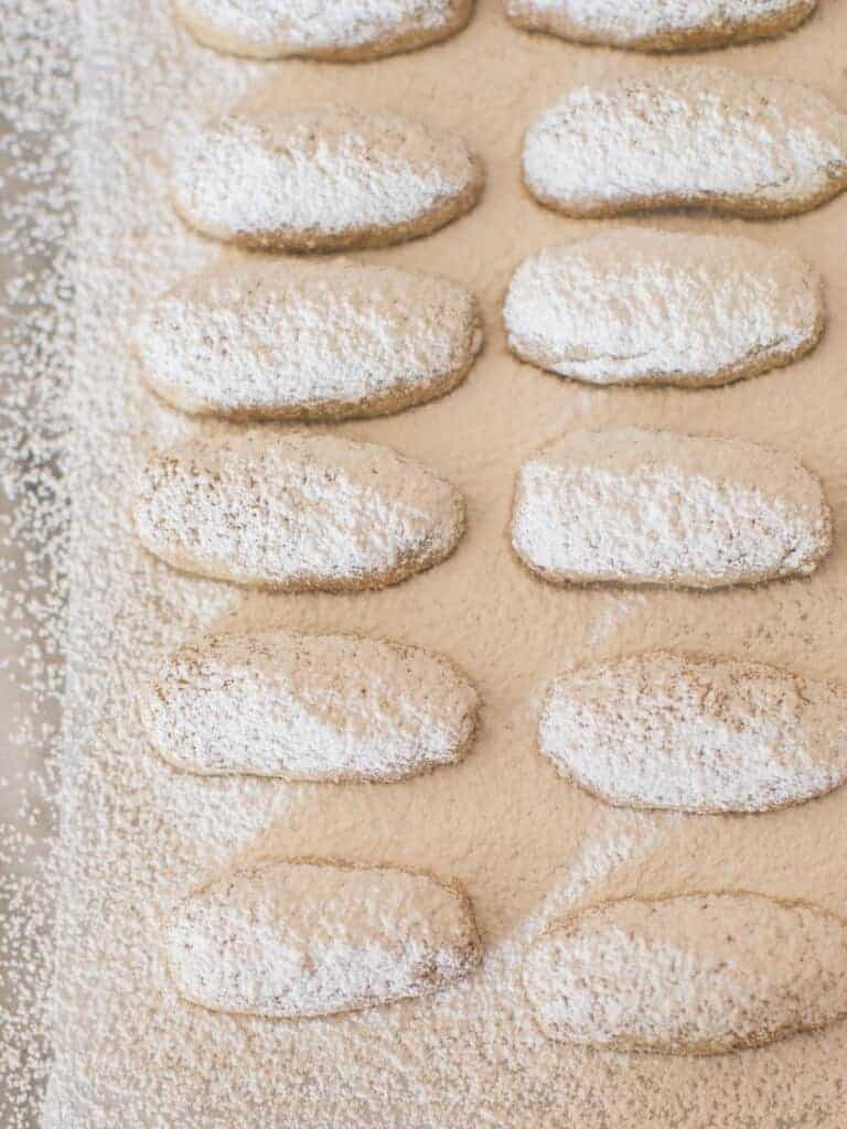 pecan cookies dusted with powdered sugar