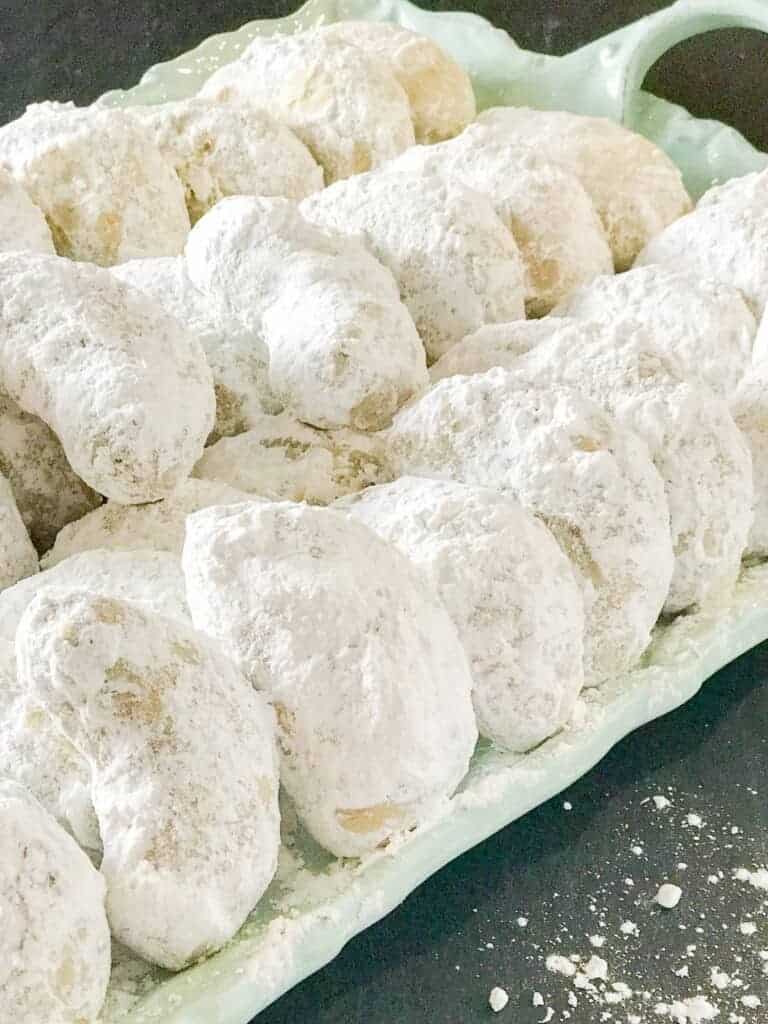 Pecan cookies rolled in powdered sugar