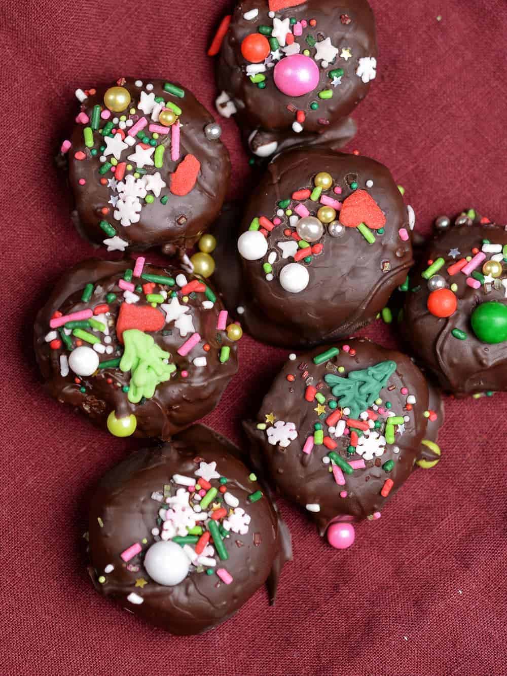 homemade mounds balls with dark chocolate and sprinkle pop sprinkles