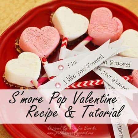 S'mores pop made from heart-shaped marshmallows. #valentinesday #ediblegifts #easy #nobake S'mores pop made from heart-shaped marshmallows.