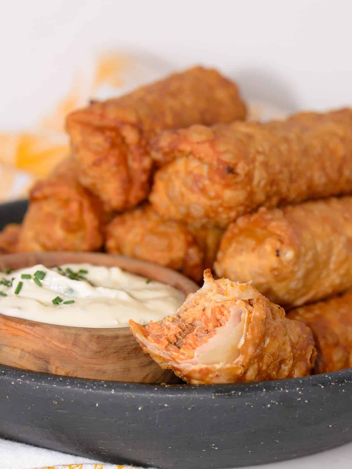 Stack of buffalo chicken egg rolls