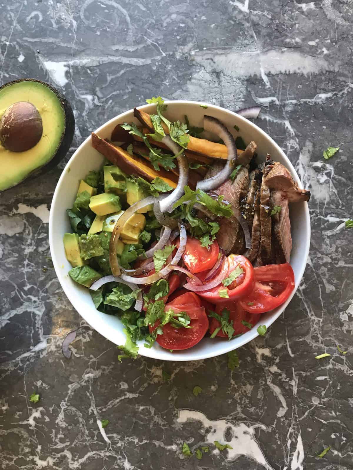 Healthy steak and sweet potato meal prep bowl. recipe by foodology geek.