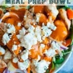 haelthy buffalo chicken meal prep bowl. Buffalo chicken on top of veggies served with a buffalo ranch dressing. healthy meal prep bowl. Pinterest image by foodology geek.