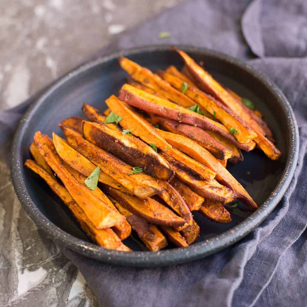 A plate of baked sweet potato fries