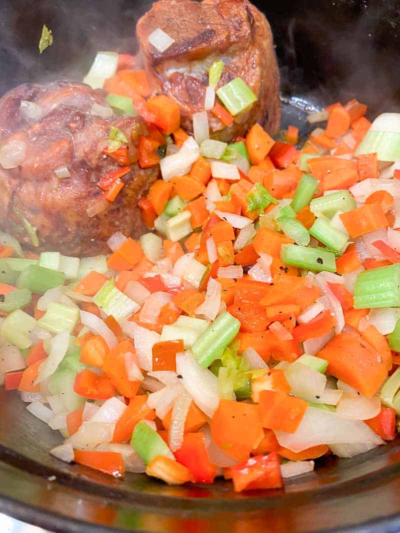 Add the smoked ham hock to the mirepoix.