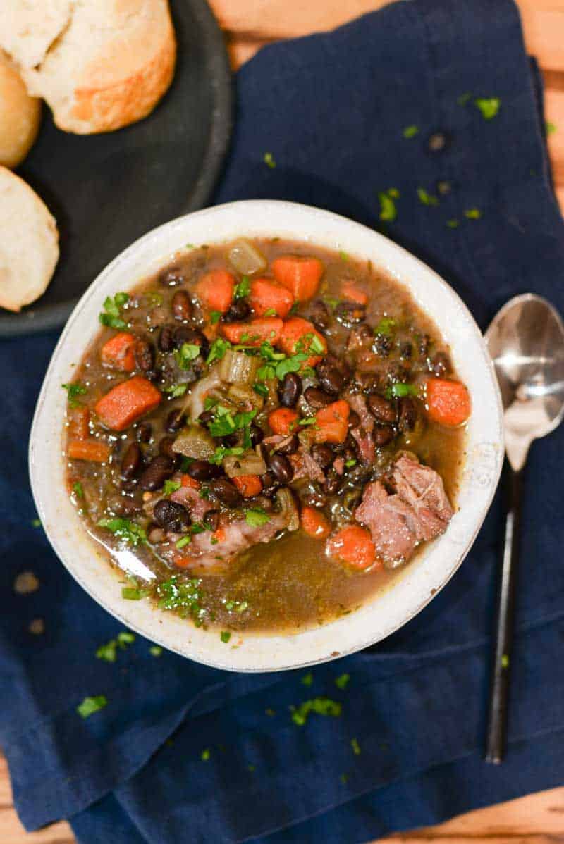 After simmering in the dutch over for at least two hours, serve up a steamy smoky bowl of ham and bean soup.