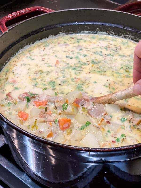 Old fashioned leek and potato soup recipe in a dutch oven.