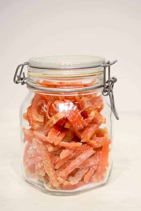 airtight jar filled with homemade candied orange peel 