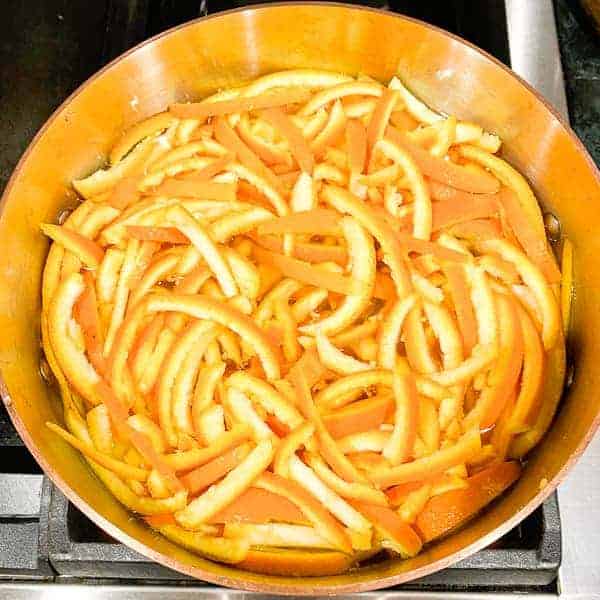 boil the orange peel slices in a 6 quart sauce pan filled with fresh water.