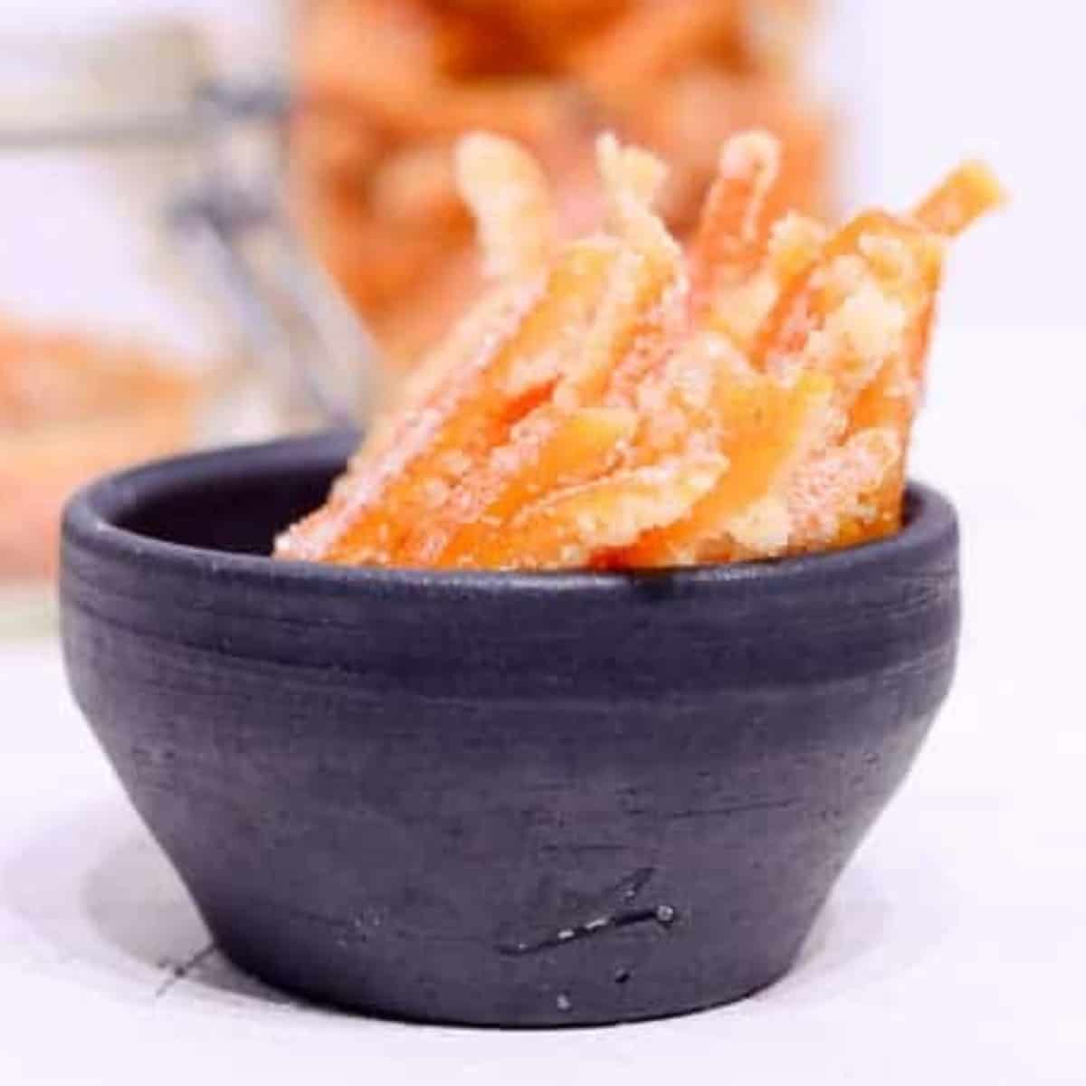 a bowl of candied orange peel