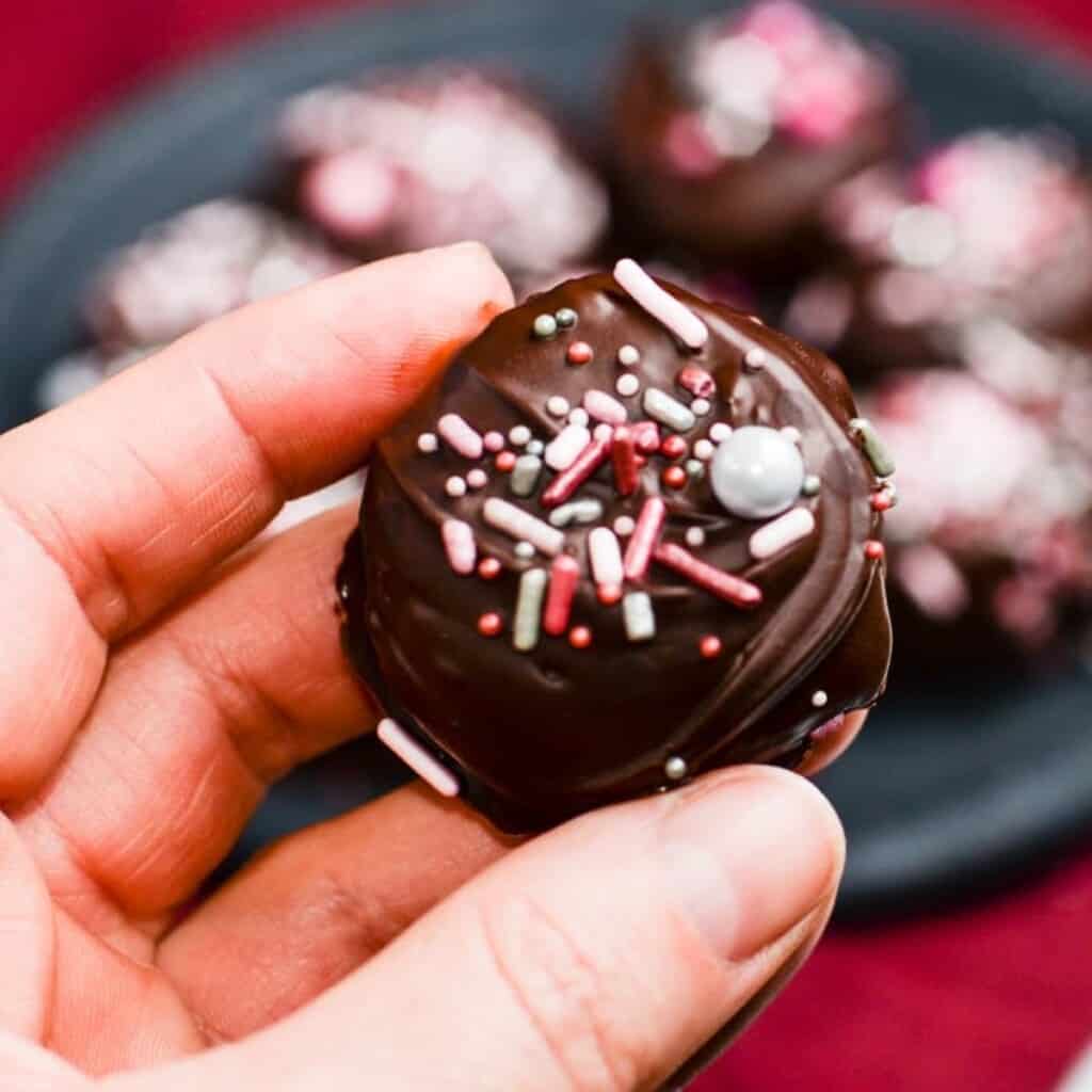 coconut truffles topped with rose gold sprinkles