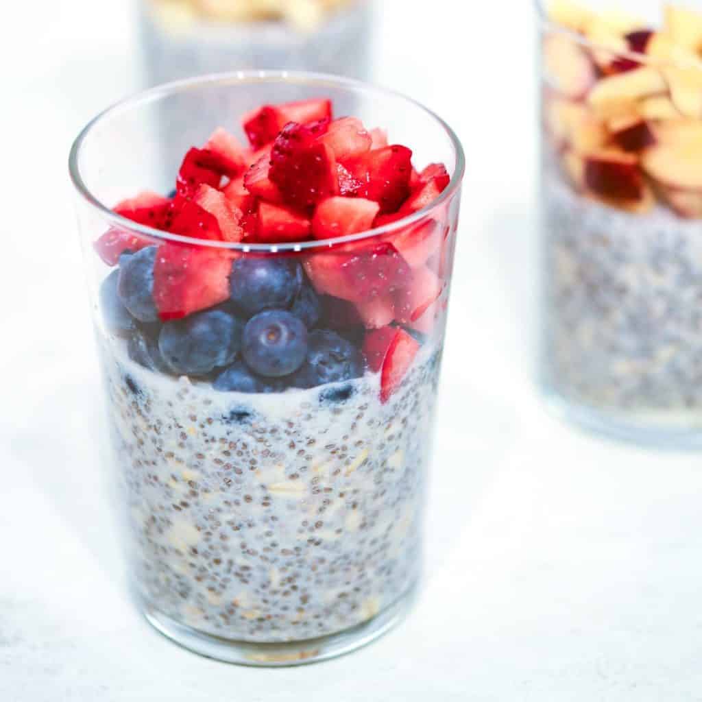 high protein overnight oats with strawberries and blueberries