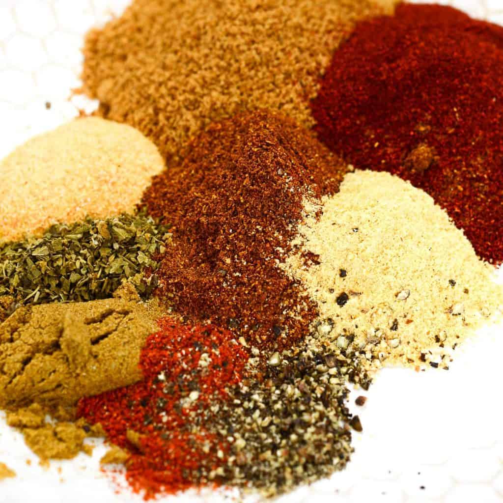 homemade bbq rub on a white plate | foodology geek