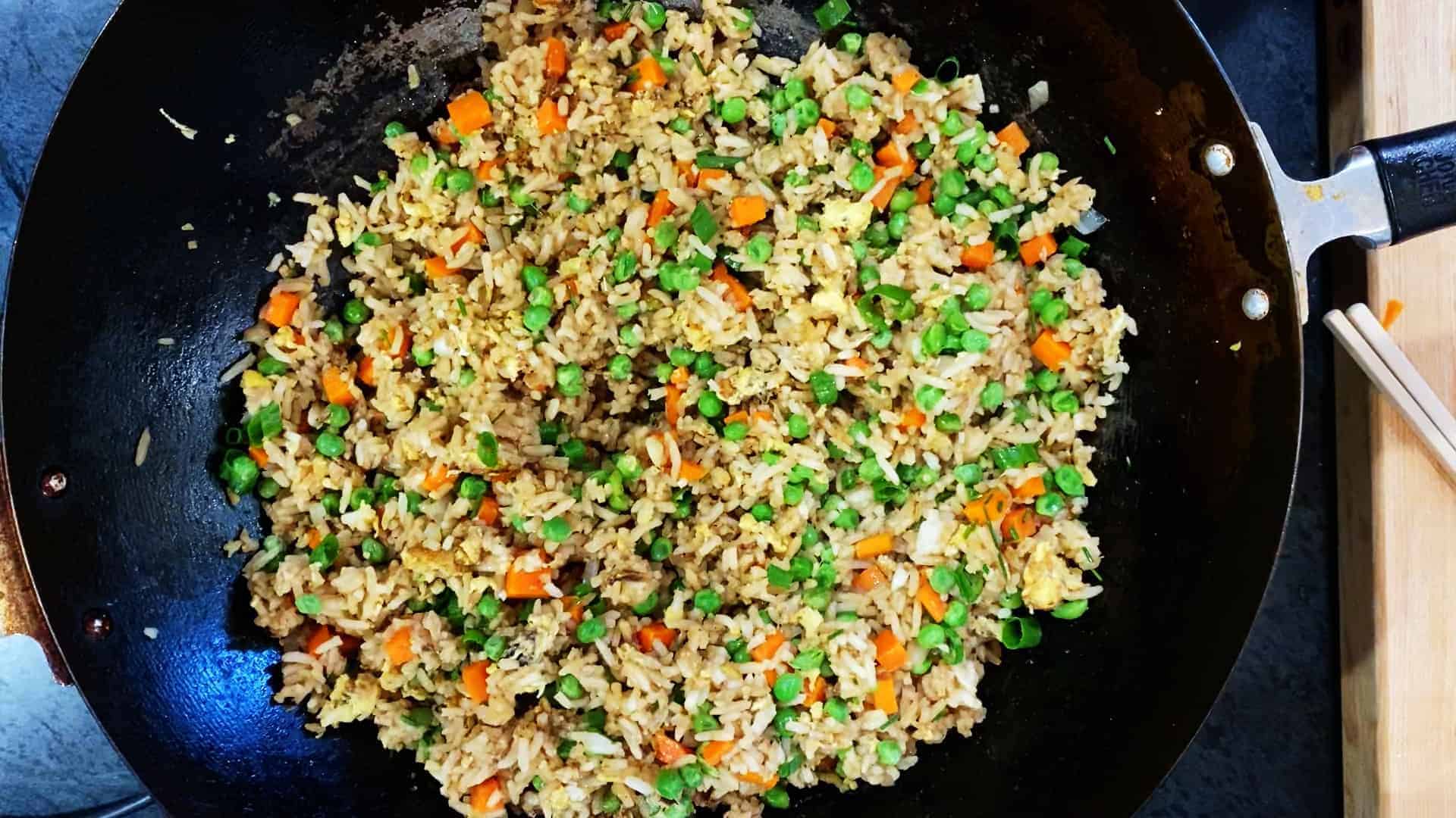 vegetable fried rice recipe in a wok. recipe by foodology geek