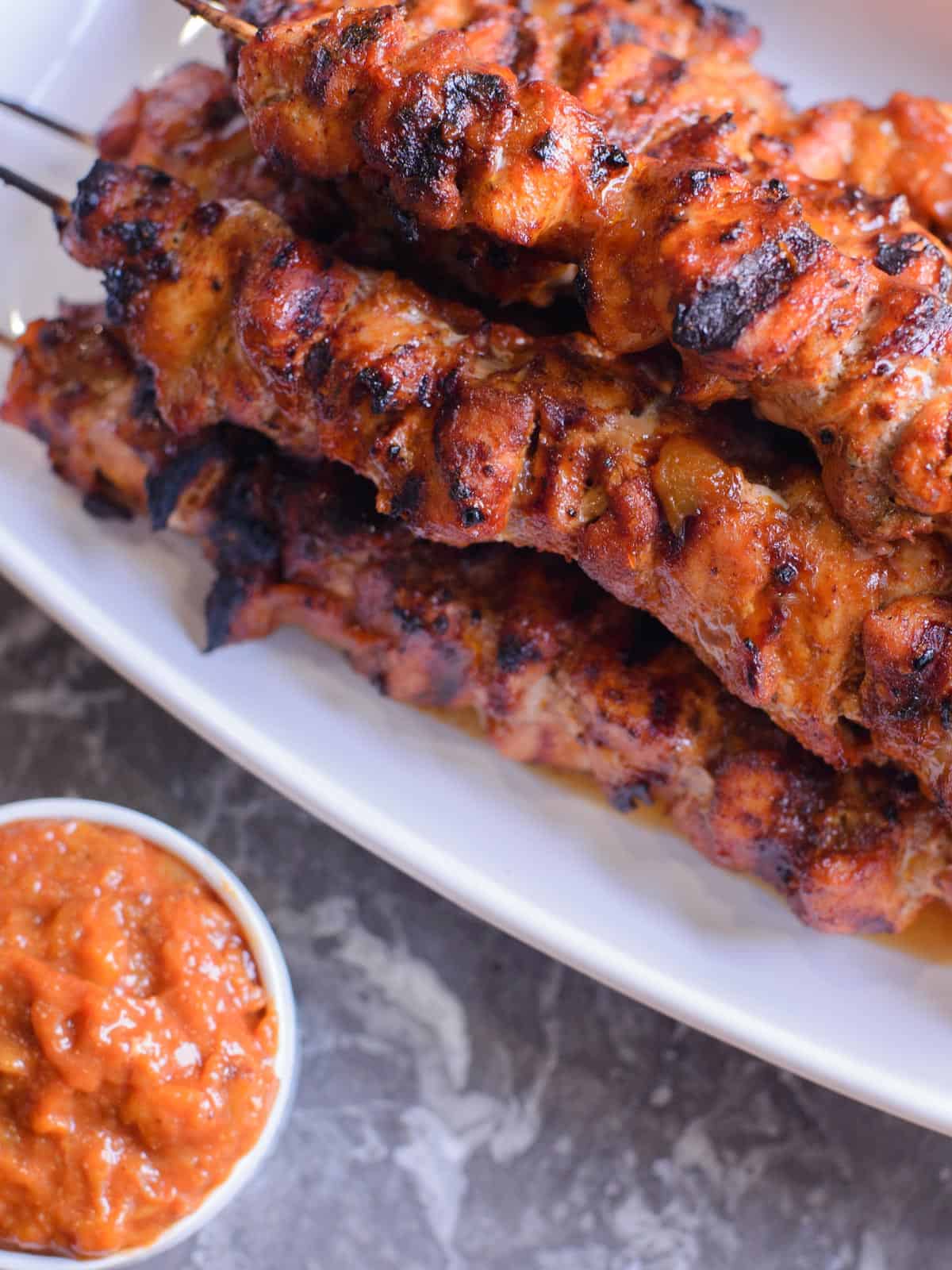 grilled pork kebobs served with peach bourbon bbq sauce