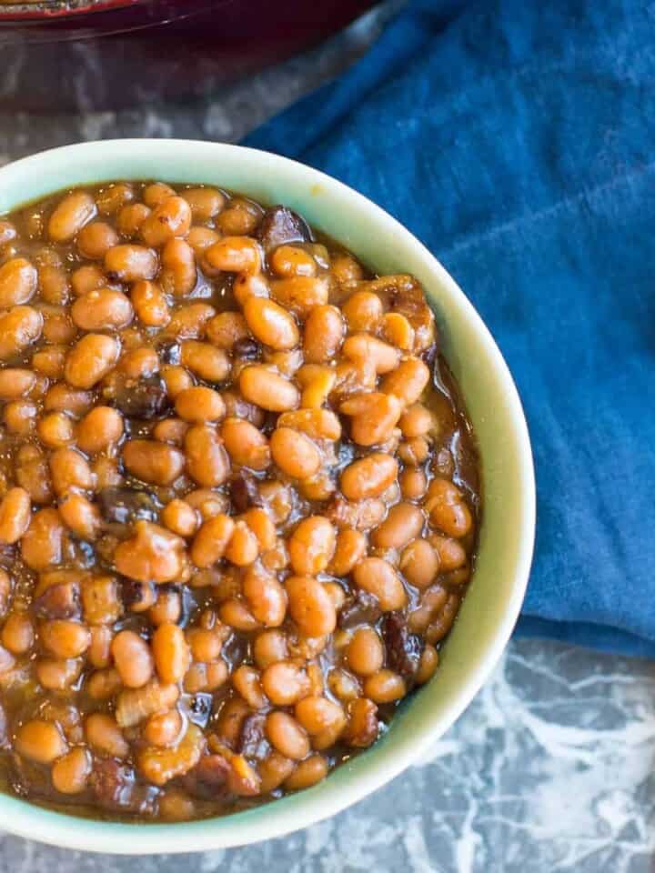 homemade baked beans in a green bowl