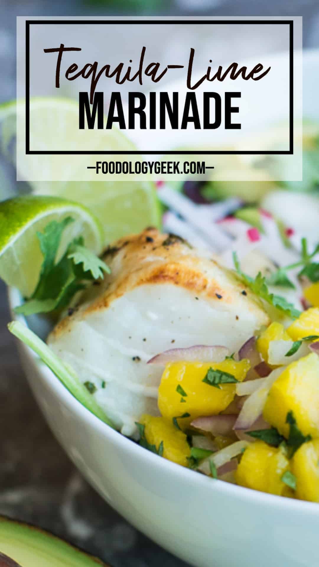 tequila lime marinated cod in a bowl with mango salsa and fresh limes