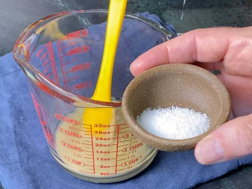 kosher salt in a small bowl, adding it to tahini dressing
