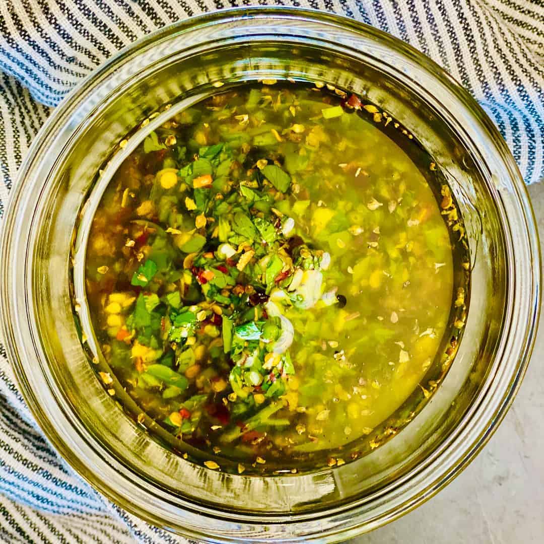 overhead view of chimichurri sauce in a bowl