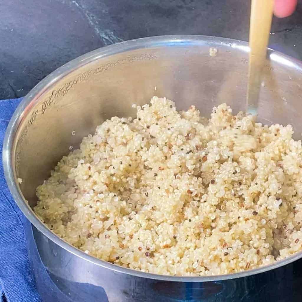 use a fork to fluff quinoa after it has set.