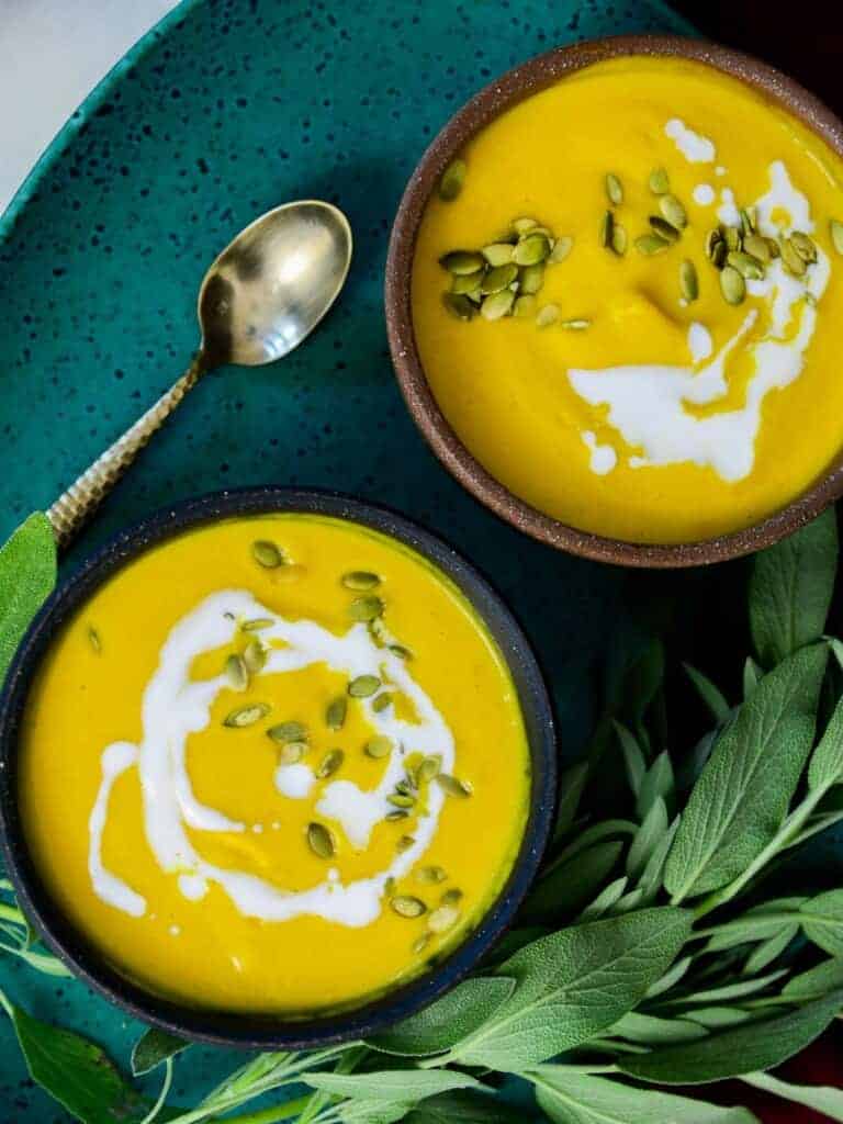 butternut squash soup with coconut milk and toasted pumpkin seeds