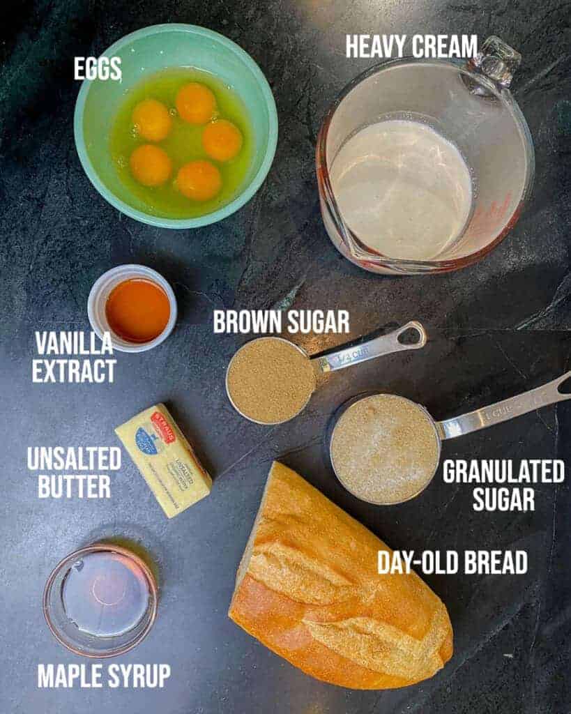 ingredients for creme brulee french toast labeled on a black counter top