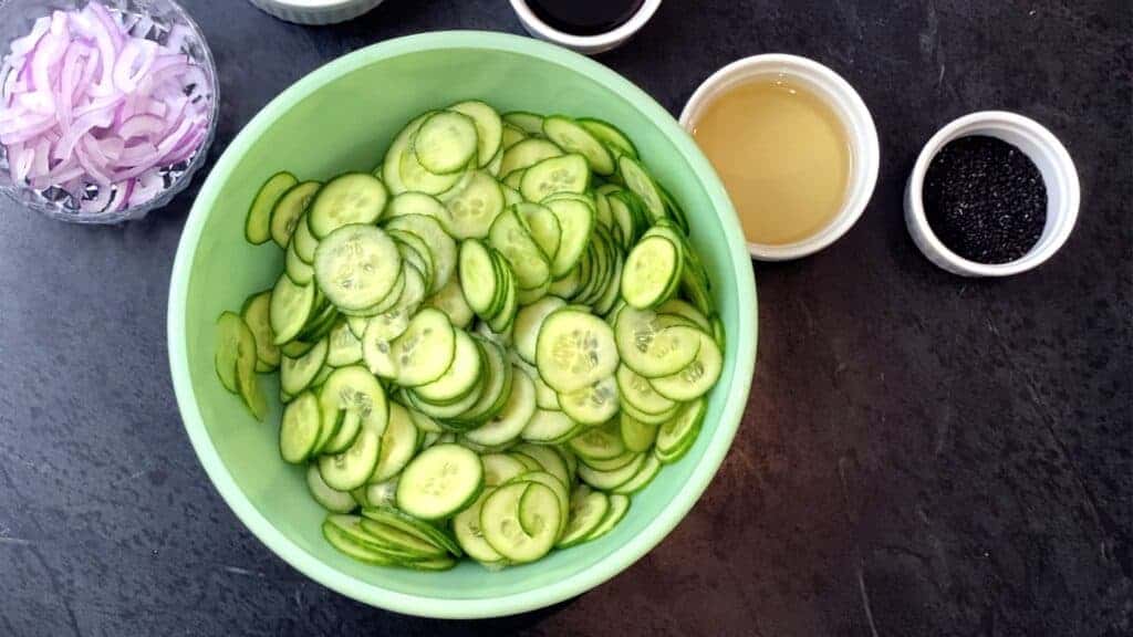 Step 2: Place the cucumber in a bowl. 