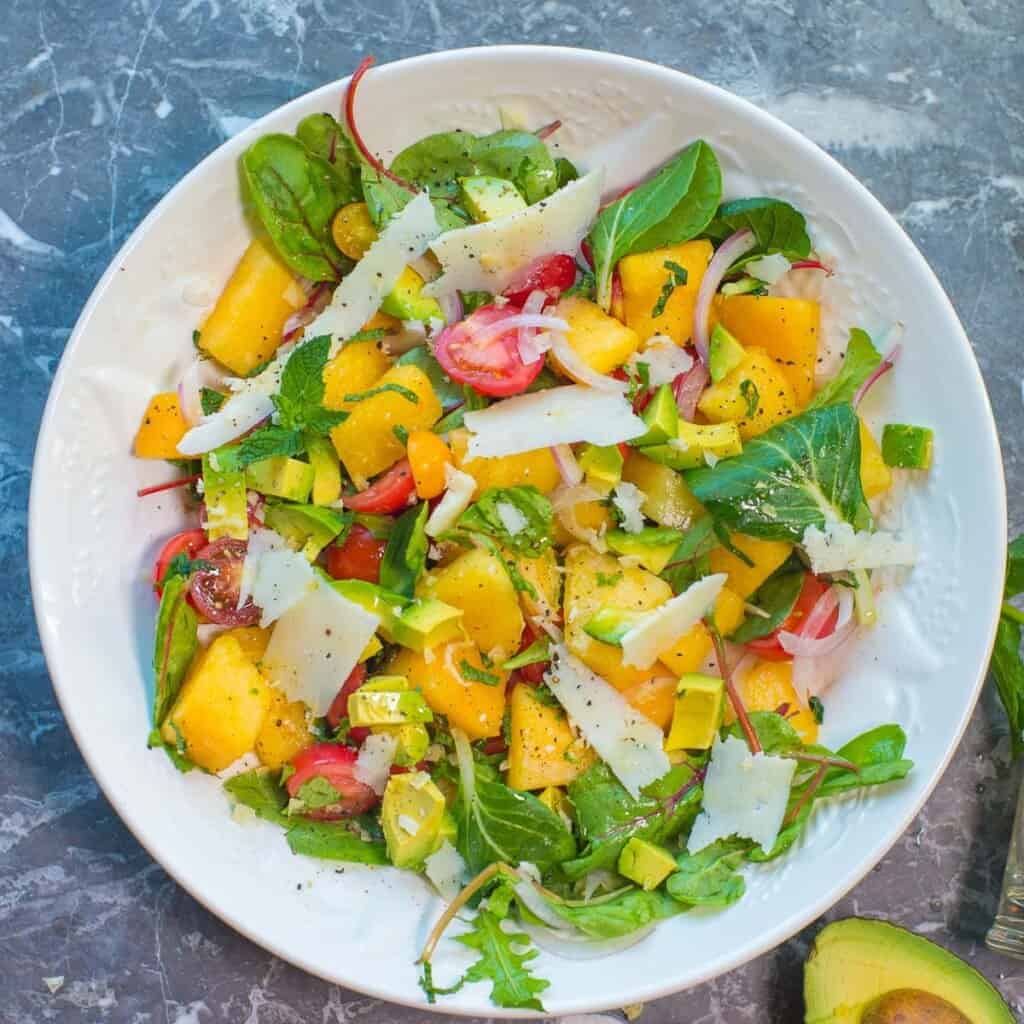 savory watermelon salad recipe with fresh tomatoes, herbs, and pecorino romano