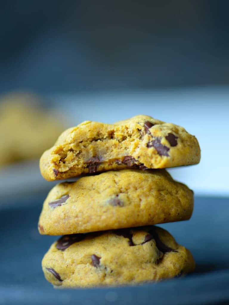 stack of chocolate chip cookies with a bite taken out