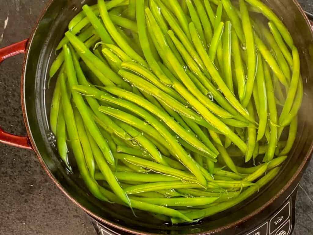 blanching green beans in a dutch oven