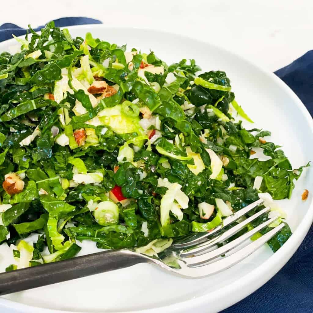 fall harvest salad on a white plate